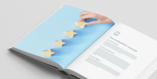 Open booklet showing a hand placing a gold star on a blue page; opposite page titled "Pre-evaluation course" with headings "01 The Assessment" and...