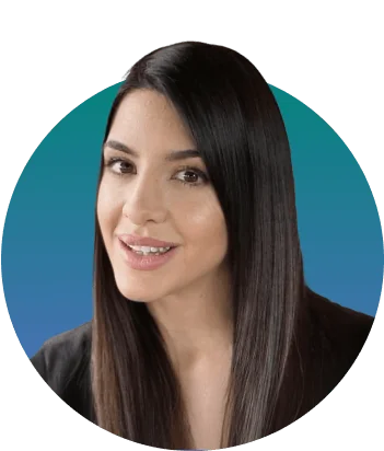Head-and-shoulders portrait of a woman smiling slightly, head tilted; long straight dark hair and dark top; set against a circular teal-to-blue...