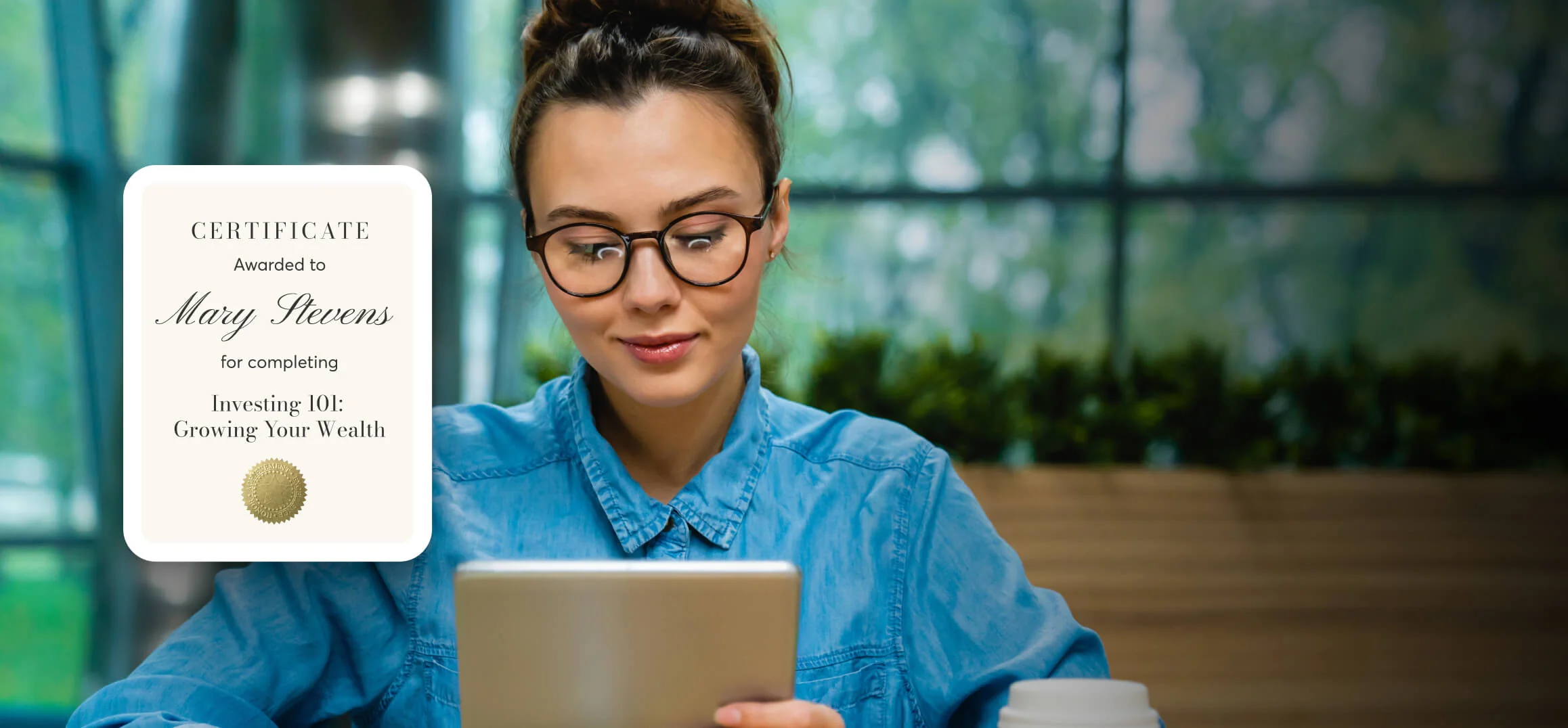 Young woman wearing glasses reads a tablet in a bright café-like space with plants; a certificate overlay appears at left.
