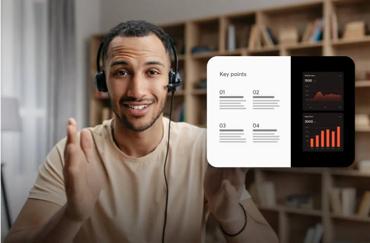 Man wearing a headset gestures and smiles while presenting a slide (object-action) in a home office with bookshelves behind him (context).