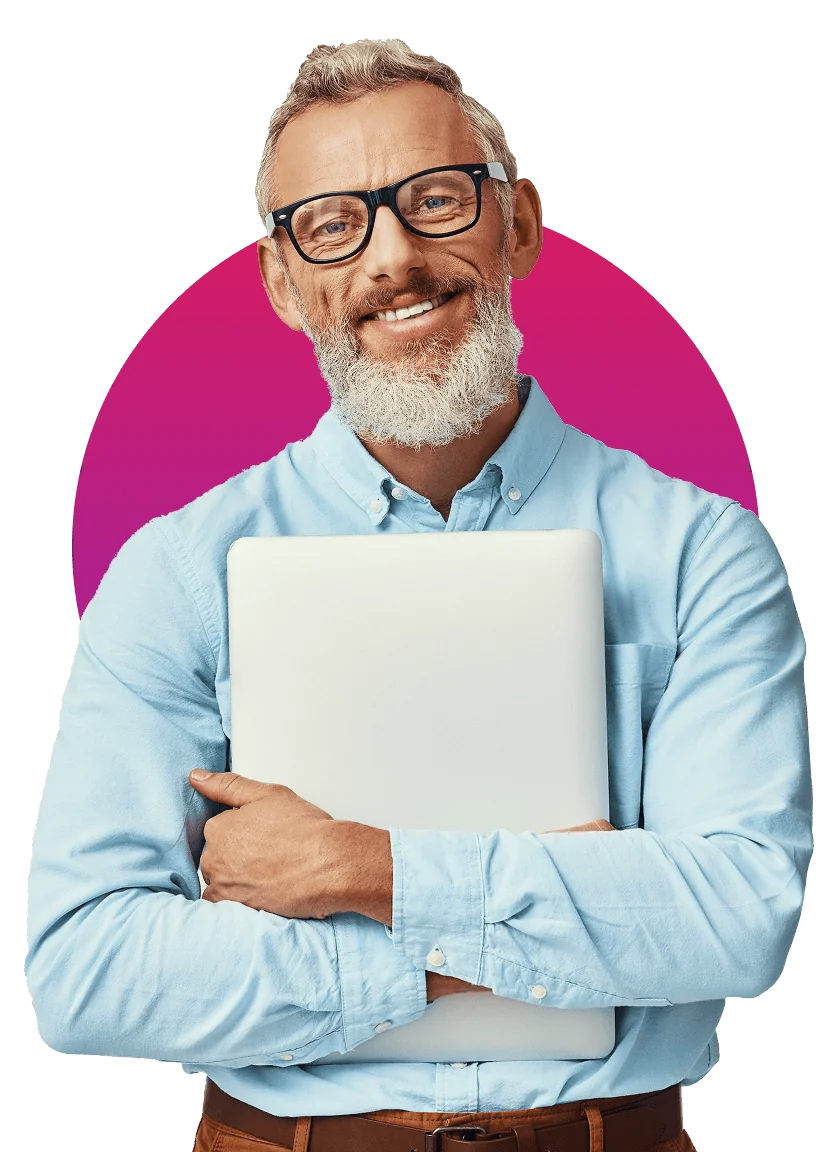 Bearded man wearing glasses and a light-blue button-down shirt hugs a closed laptop to his chest, smiling; magenta semicircle behind him against a...